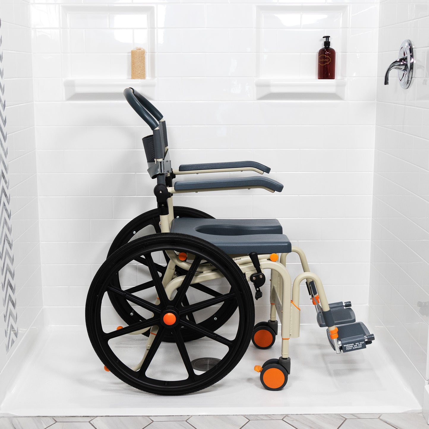 Self-propelled roll-In shower chair inside shower from AskSAMIE