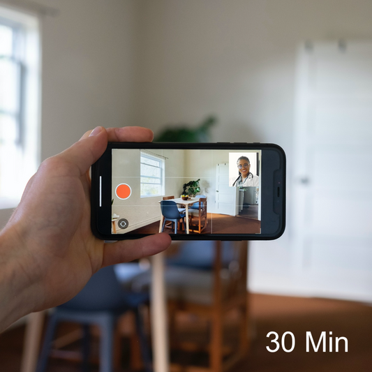 Person holding a cell phone on a video call with a doctor | AskSAMIE 30 min virtual assessment