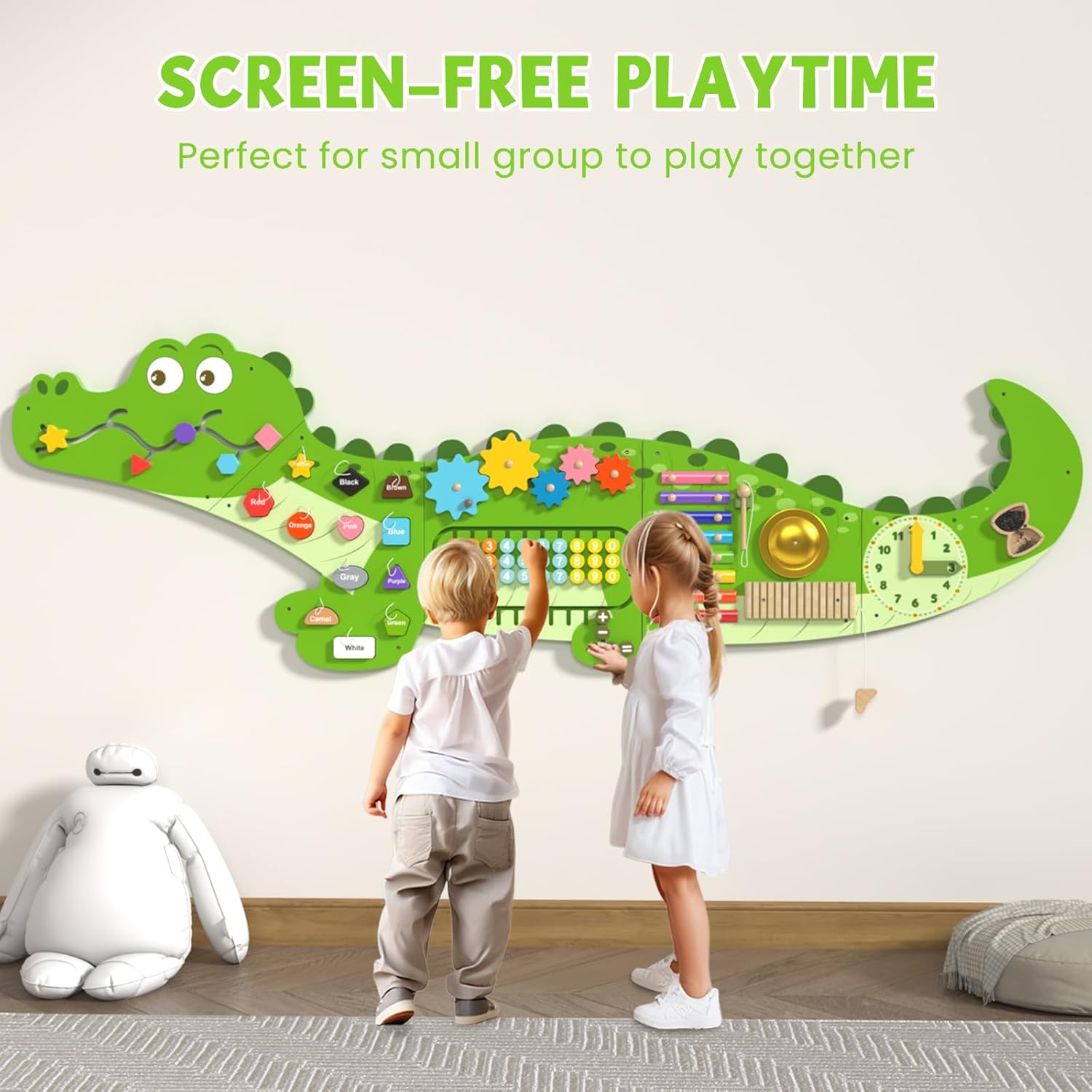 Children playing with Sensory Busy Board (Big Crocodile) fixed on wall from AskSAMIE