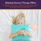 Pressure-activated Vibrating Massage Pillow hugged by child while lying in bed from AskSAMIE