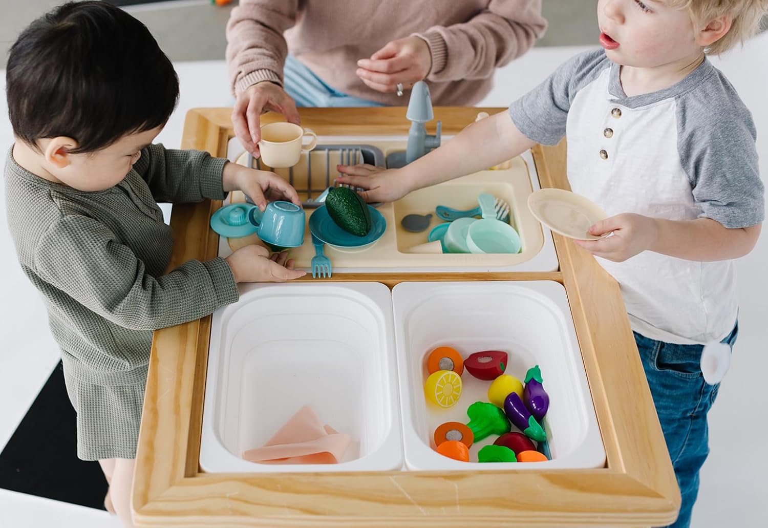 Children playing with Sensory Table and toys from AskSAMIE