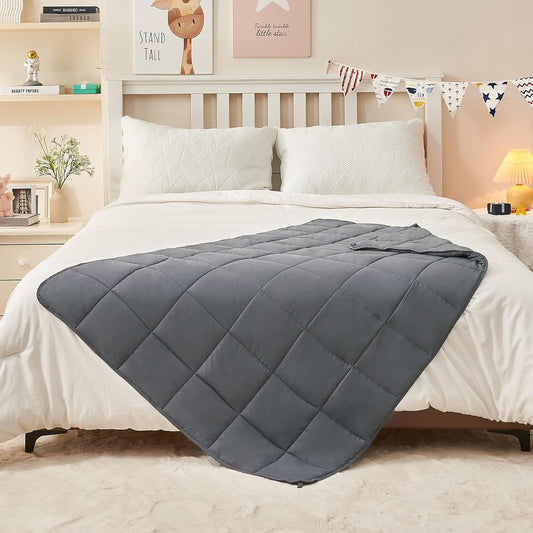 Weighted Blanket in bed from AskSAMIE